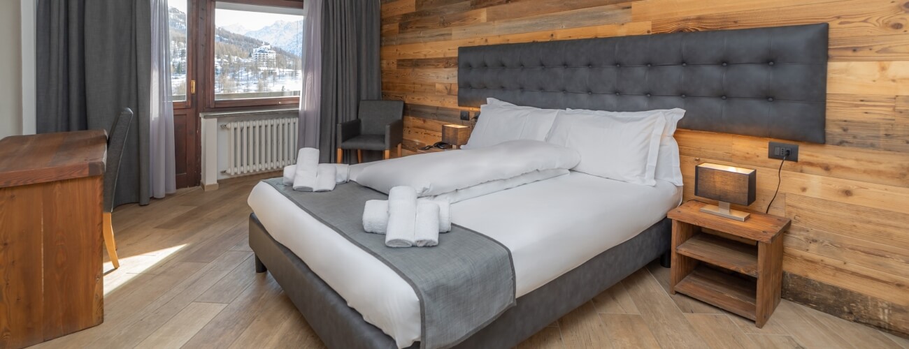 GRAN-ROC–CAMERE–MATRIMONIALE–Gran-roc-camera-matrimoniale-3-1300×500